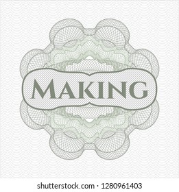 Green money style rosette with text Making inside