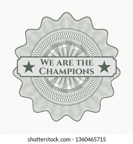Green money style rosette with text We are the Champions inside