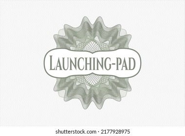 Green money style rosette with text Launching-pad inside