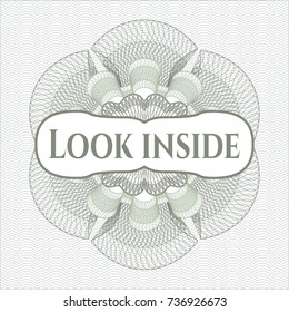 Green money style rosette with text Look inside inside