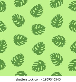Green monstera leaves on light green background, tropical seamless pattern. Trendy summer style, vector illustration