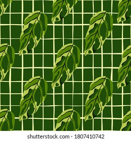 Green monstera silhouettes seamless pattern. Chequered background. Stylized tropical print. Perfect for wallpaper, textile, wrapping paper, fabric print. Vector illustration.