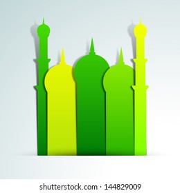 Green mosque on abstract blue background.