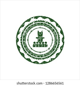 Green motivational speech icon inside distress grunge style stamp