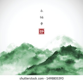 Green mountain forests hand drawn with ink. Traditional oriental ink painting sumi-e, u-sin, go-hua. Hieroglyphs - eternity, freedom, happiness, silence.