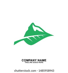 Green mountain logo concept. Green Leaf With mountain logo vector