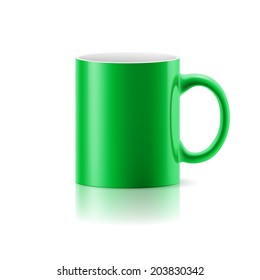 Green mug made of ceramics on white background.