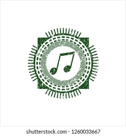 Green musical note icon inside rubber grunge stamp