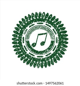 Green musical note icon inside rubber seal with grunge texture