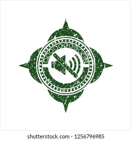 Green mute icon inside distressed rubber grunge texture seal