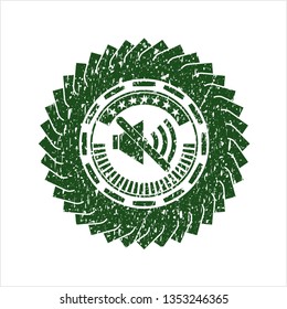 Green mute icon inside distressed rubber grunge texture seal