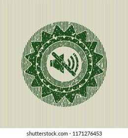 Green mute icon inside grunge style stamp