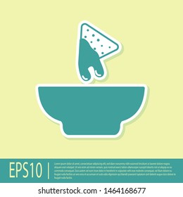 Green Nachos in plate icon isolated on yellow background. Tortilla chips or nachos tortillas. Traditional mexican fast food. Vector Illustration