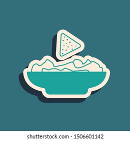 Green Nachos in plate icon isolated on blue background. Tortilla chips or nachos tortillas. Traditional mexican fast food. Long shadow style. Vector Illustration