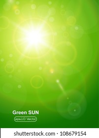 Green natural  background with summer sun and lens flare.