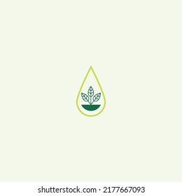 Green Natural organic leaf and droplet of water logo symbol in isolated background