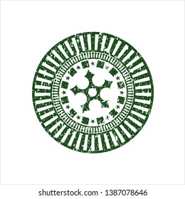 Green ninja star icon inside distress rubber texture