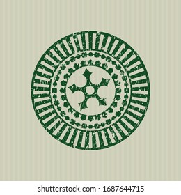 Icono de estrella de ninja verde dentro del sello de hule