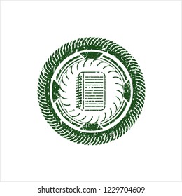 Green note book icon inside distress rubber grunge seal