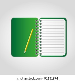 Green notebook with pencil.