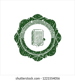 Green notebook with pencil icon inside distressed rubber grunge stamp