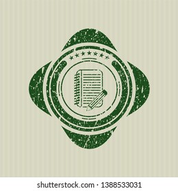 Green notebook with pencil icon inside rubber stamp