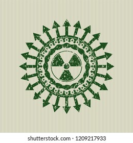 Green nuclear, radioactive icon inside grunge stamp