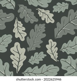 Green oak leaves vector seamless pattern. Texture of a leaf fall deciduous tree branch for fabrics, wrapping paper, backgrounds and other designs.