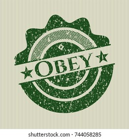 Green Obey distressed grunge seal