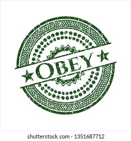 Green Obey rubber stamp