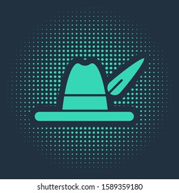 Green Oktoberfest hat icon isolated on blue background. Hunter hat with feather. German hat. Abstract circle random dots. Vector Illustration