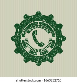 Green old phone icon inside distressed rubber stamp with grunge texture
