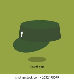 Green olive canvas cadet cap on light green background. It is a soft kepi with flat top, round visor and it is also called patrol cap or field cap.