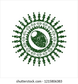 Green olive icon inside distressed rubber texture