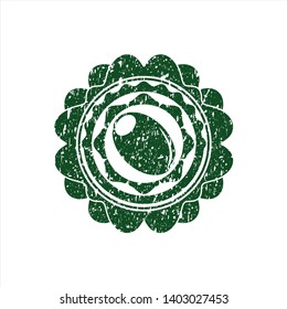 Green olive icon inside rubber stamp with grunge texture