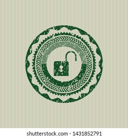 Green open lock icon inside grunge style stamp