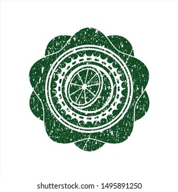 Green orange icon inside distress rubber seal with grunge texture
