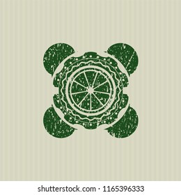 Green orange icon inside distressed rubber stamp