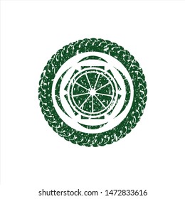 Green orange icon inside grunge stamp