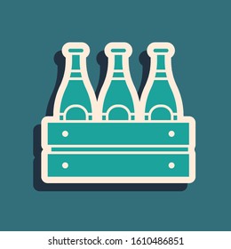 Green Pack of beer bottles icon isolated on blue background. Wooden box and beer bottles. Case crate beer box sign. Long shadow style. Vector Illustration