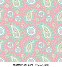 Green paisley pattern on pink background