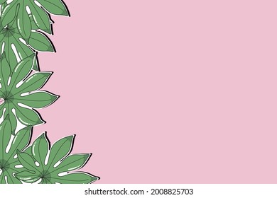 Green palm leaves on pink background. Flat lay, top view.