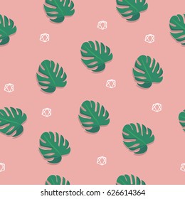 Green palm leaves on the pink background. Vector seamless pattern. Tropical illustration. Fashion jungle print for design.