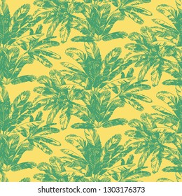 Green palm tree leaves on yellow background seamless pattern