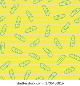 Green paper clips seamless vector pattern on yellow background. Surface print design. For farics, stationery, and packaging.