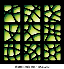 Green paper cutouts on a black background