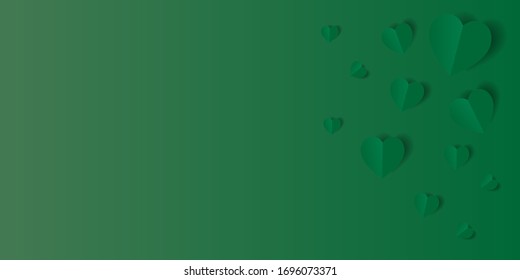 green paper heart in white background.