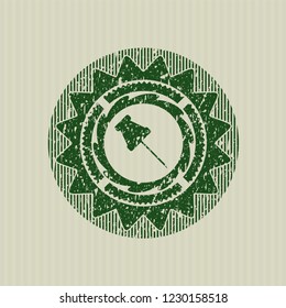 Green paper pin icon inside distress rubber grunge texture seal