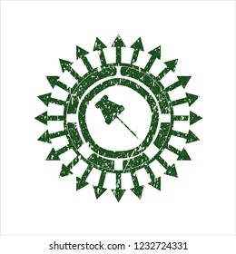 Green paper pin icon inside grunge style stamp