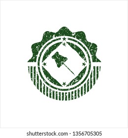 Green paper pin icon inside distress grunge stamp